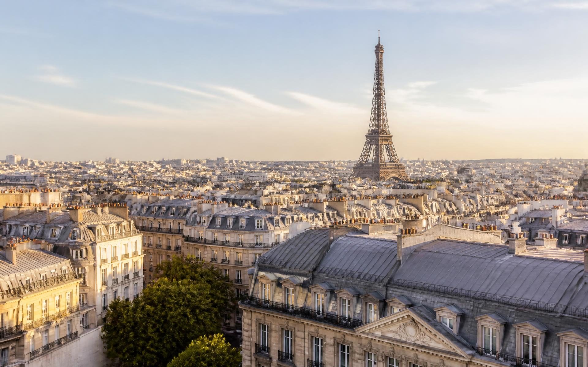 Central Paris rooftops with the Eiffel Tower in the distance